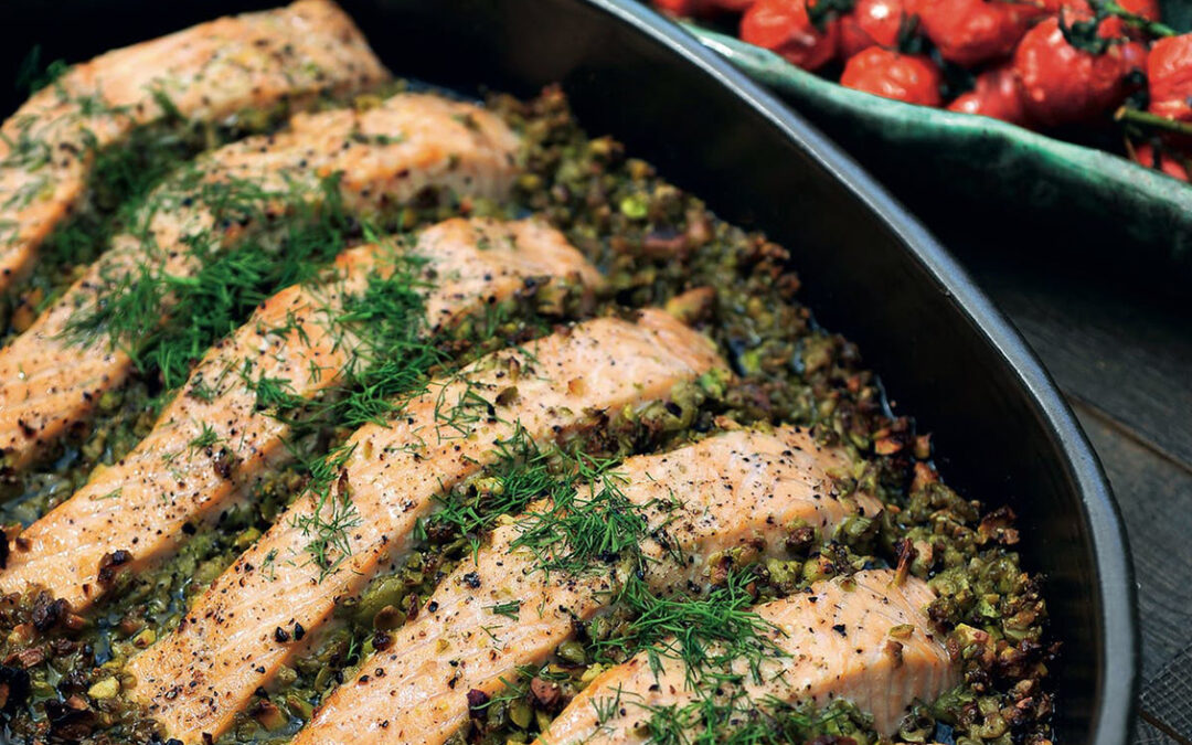 Salmon with olive-pistachio tapenade & tomatoes
