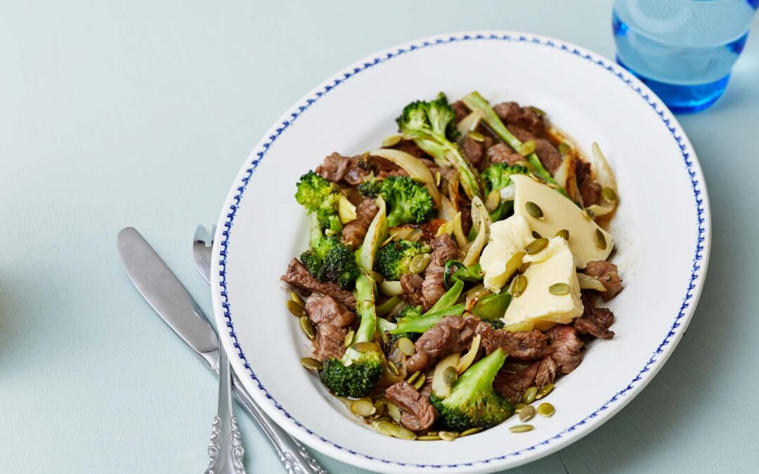 Steak and broccoli stir-fry with toasted pumpkin seeds