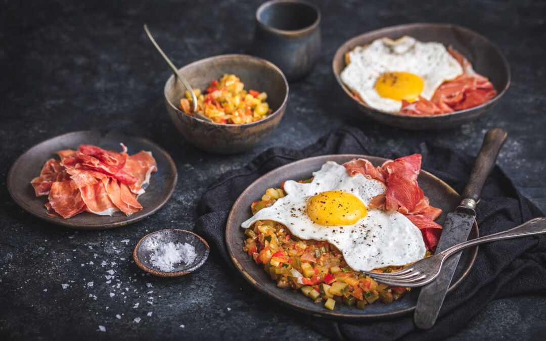 Spanish ratatouille with egg and Serrano ham