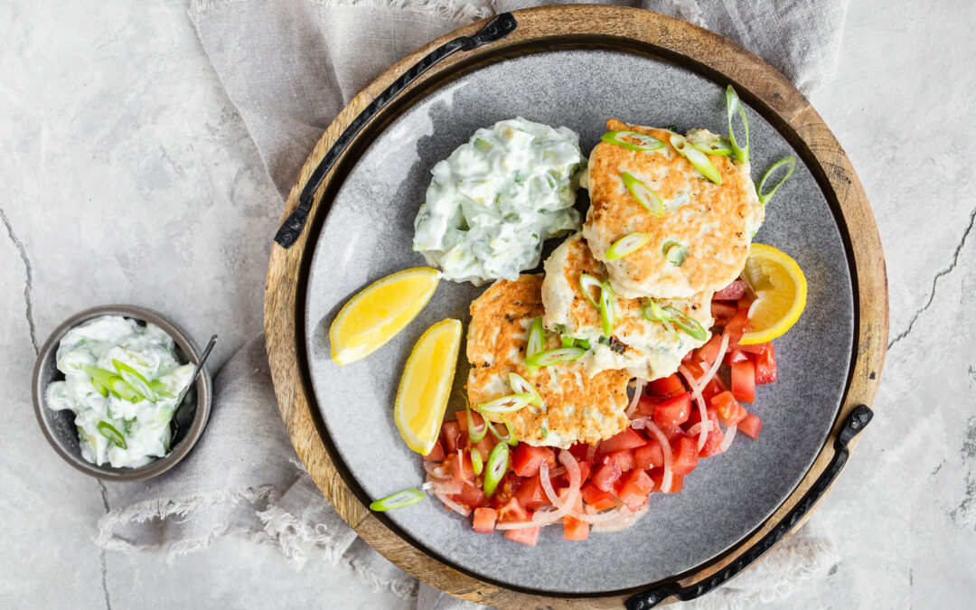 Keto chicken fritters with avocado tzatziki and tomato salad