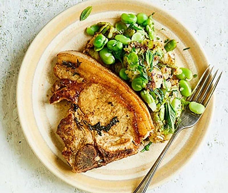 Pork chops with broad bean & minted Jersey smash